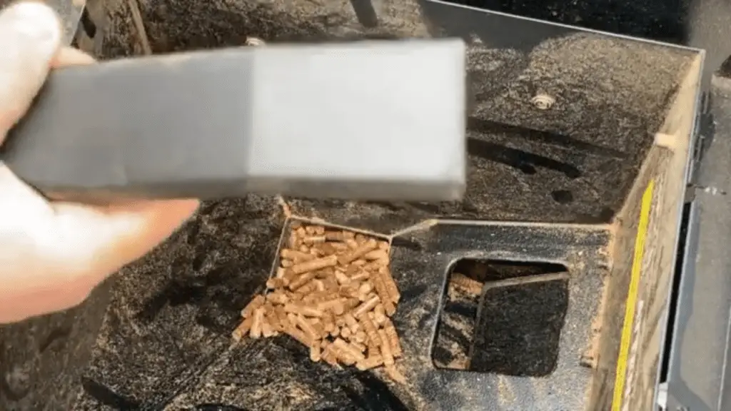 how to empty pellets from traeger